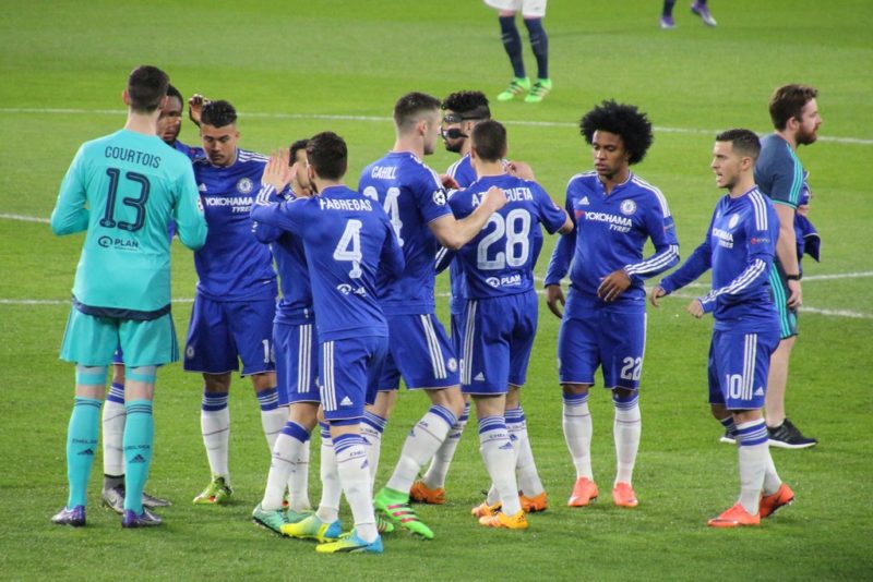 Chelsea players celebrating a win