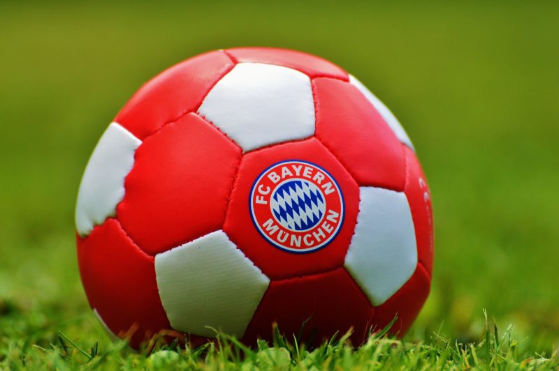 A football with Bayern logo on grass